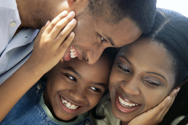 family smiling and happy