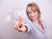 Woman pressing social network button with one hand