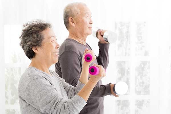 Happy-Senior-Couple-Exercising