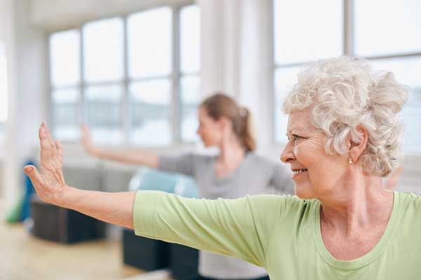 Senior-Woman-Doing-Stretching